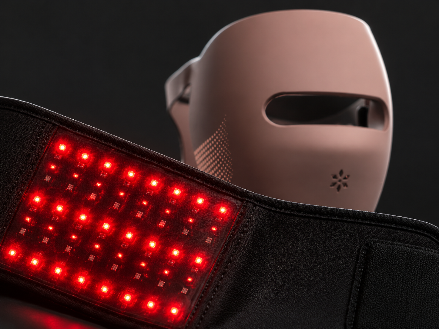 Close-up of the Lumovex red light therapy belt LEDs and Spectrum Pro mask
