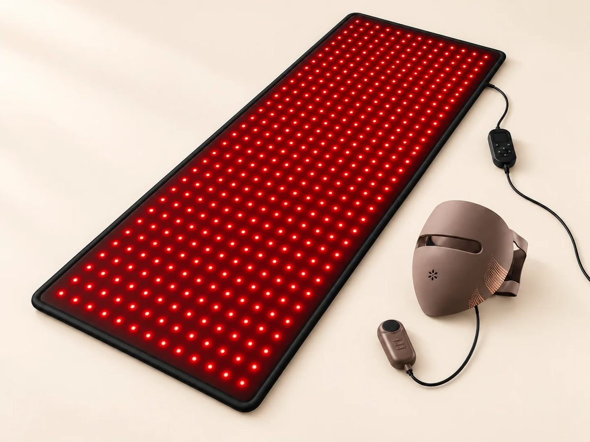Lumovex Face and Body Ritual Kit with Spectrum Pro mask, recovery mat and both controllers on a cream background.