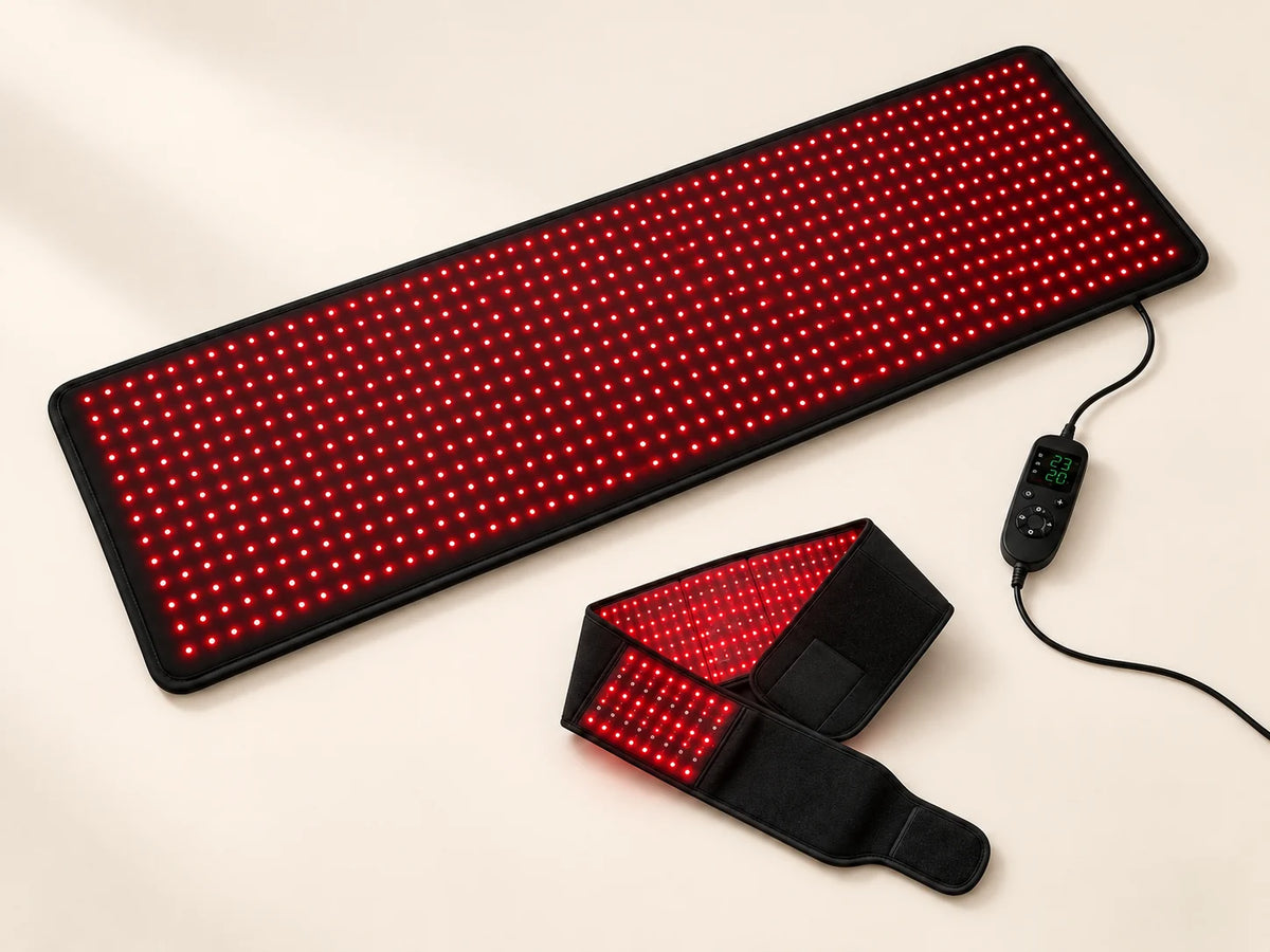 Lumovex Recovery Kit with the red LED mat, wired controller and wearable therapy belt on a cream background.